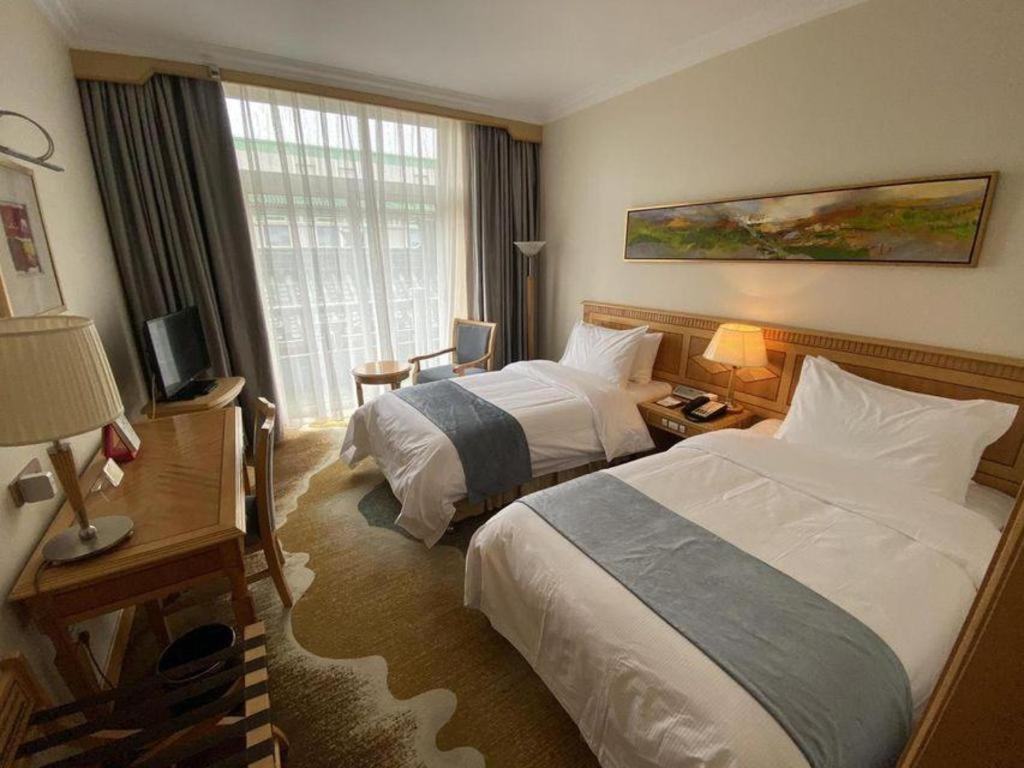 Friendship Jing Bin Building Hotel 4*